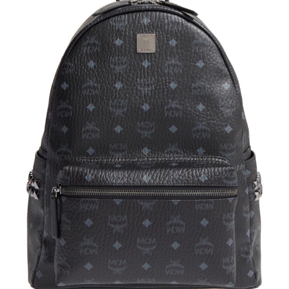 Authentic MCM medium studded backpack .